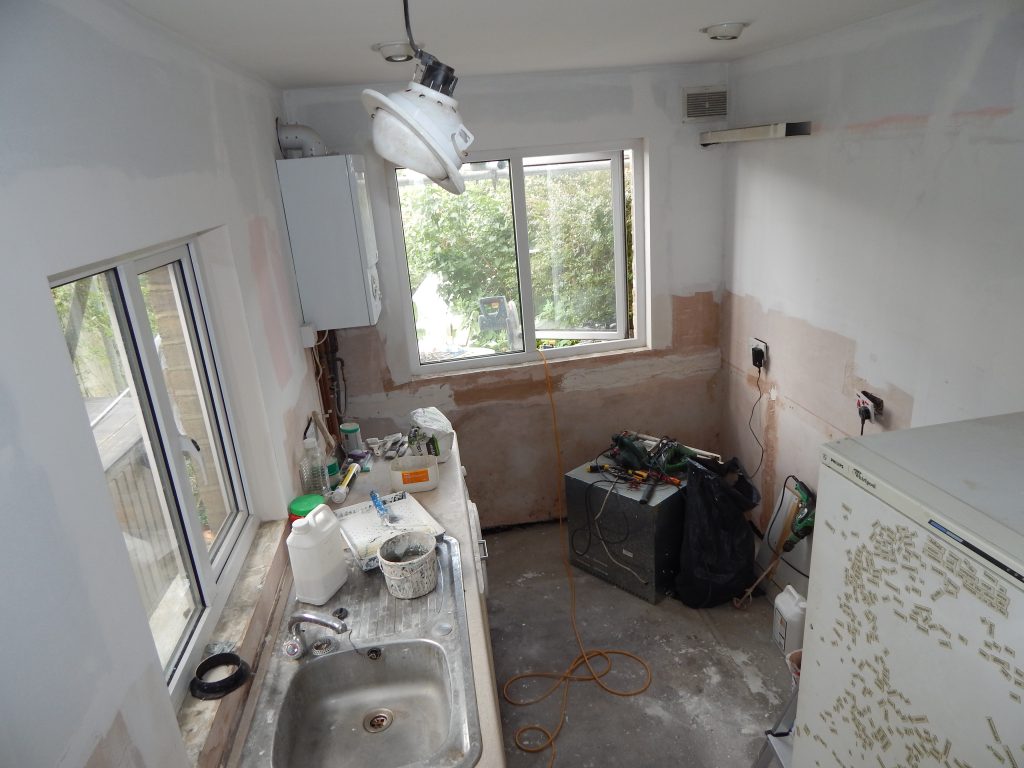 Should You Plaster behind Kitchen Units